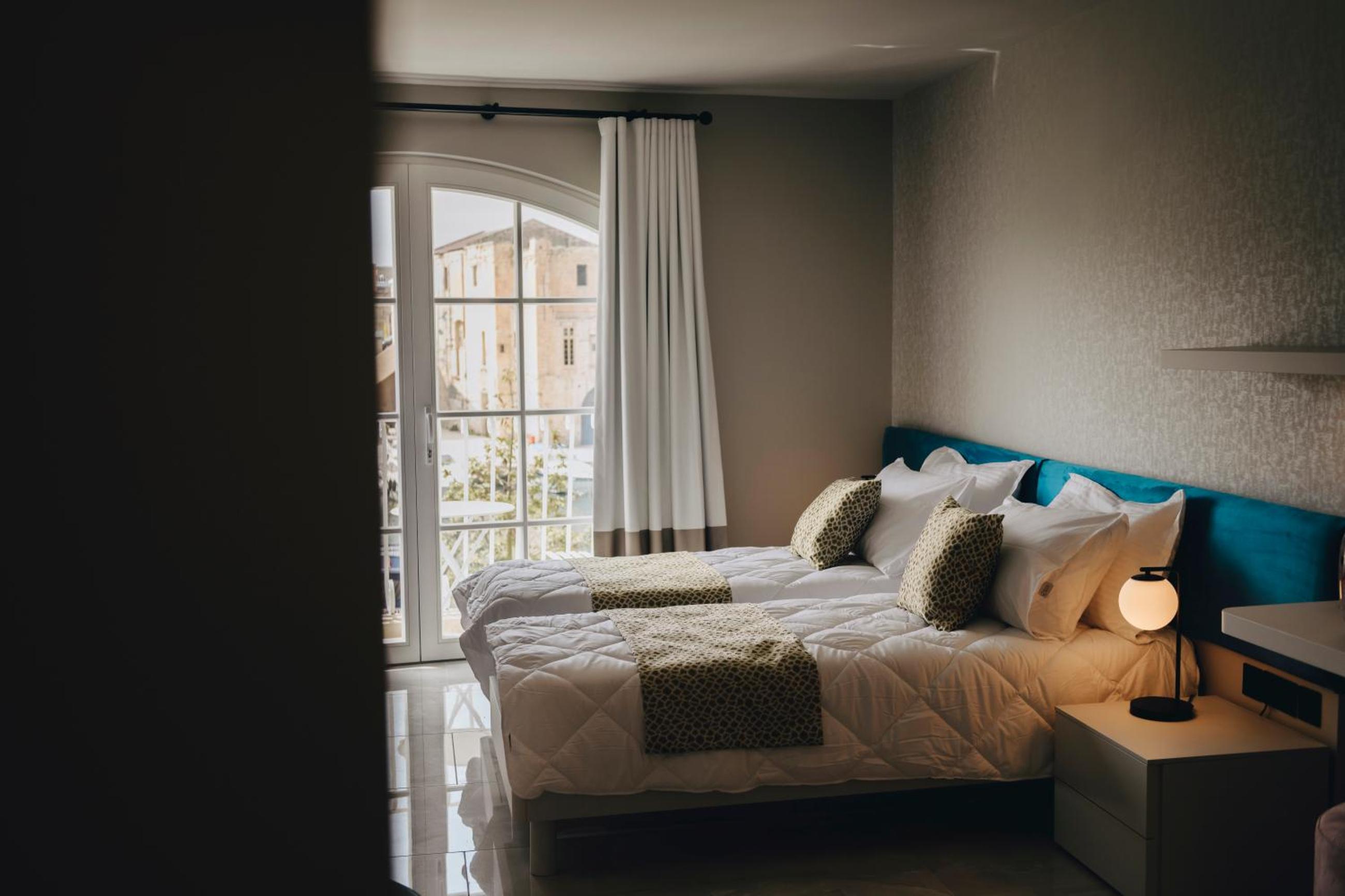 Habitació Doble Deluxe - 1 o 2 Llits amb Vistes al Mar a Dock 1 Boutique Hotel